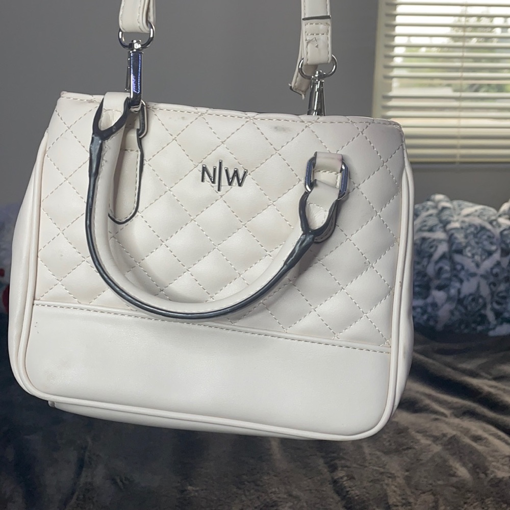 Purse from north west, white